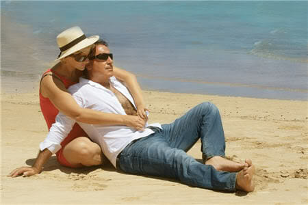 Couple hugging on beach